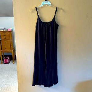 Modal/polyester. Never worn.  3/4 length